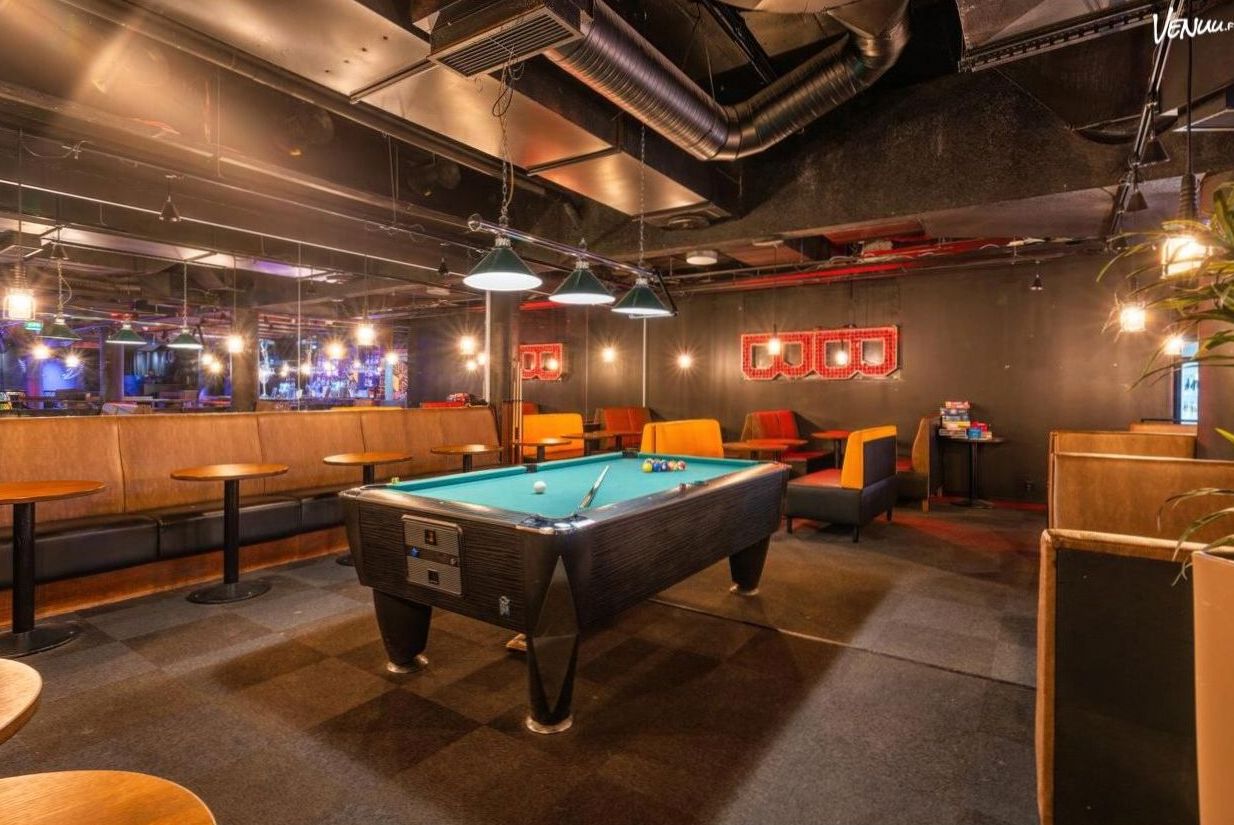 Refined gaming atmosphere with elegant decor and warm lighting
